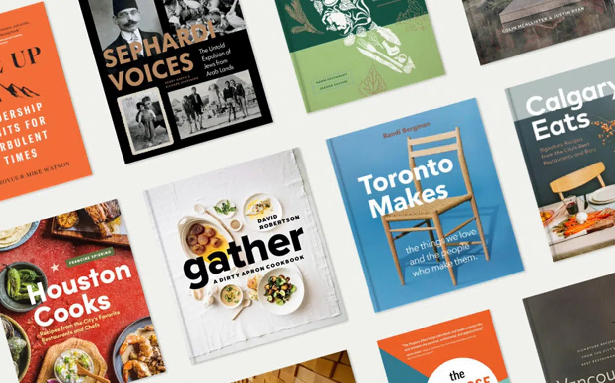 View of several books laid out in a grid, representing Figure 1 Publishing in Vancouver & EKB law firm