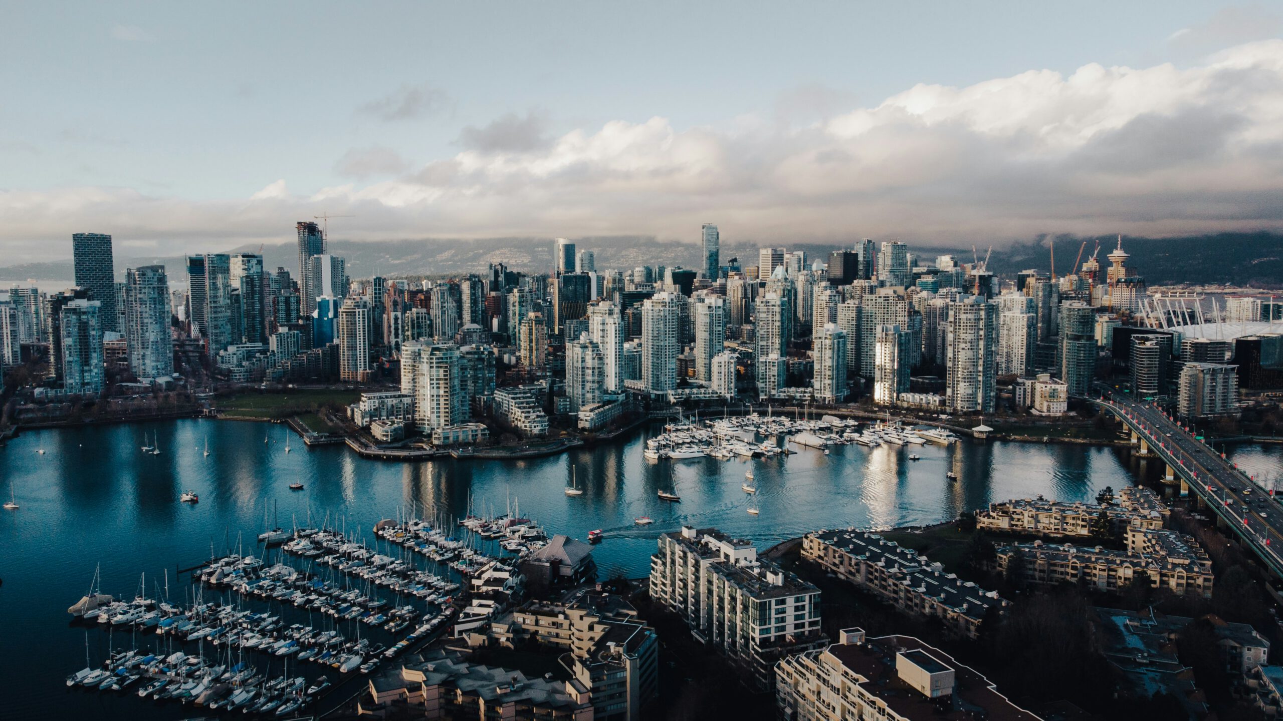 Aerial view of downtown Vancouver across the water, representing EKB law firm, a full-service corporate-commercial Vancouver law firm